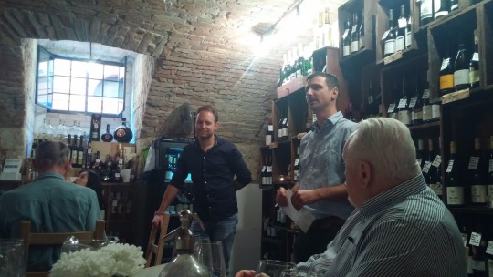 an image of a wine pairing dinner at the Tasting Table